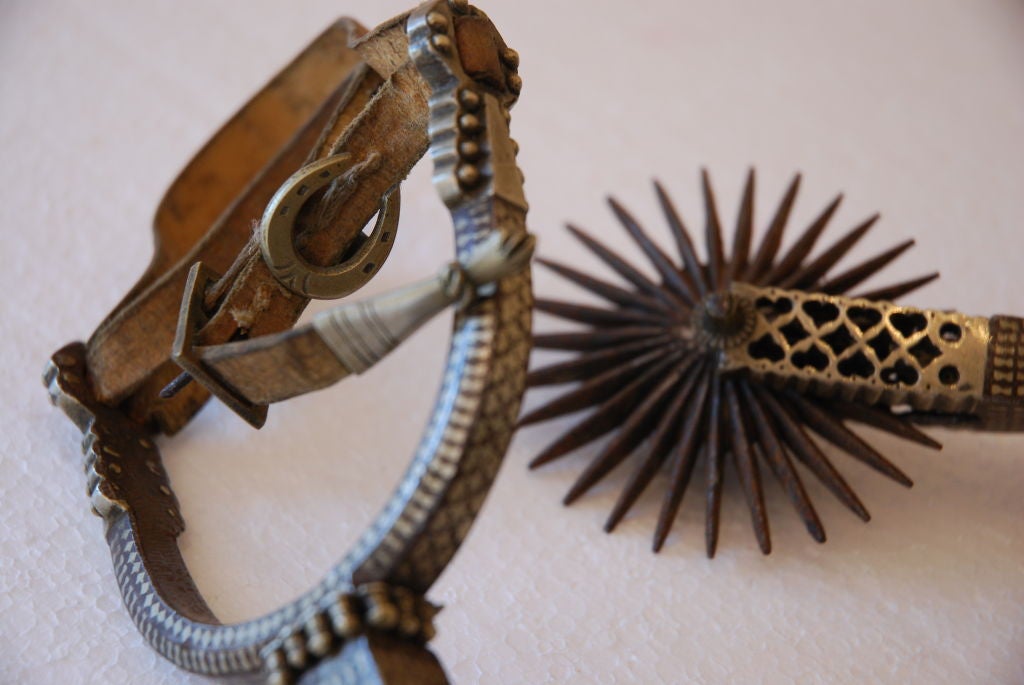 a pair of early dress spurs