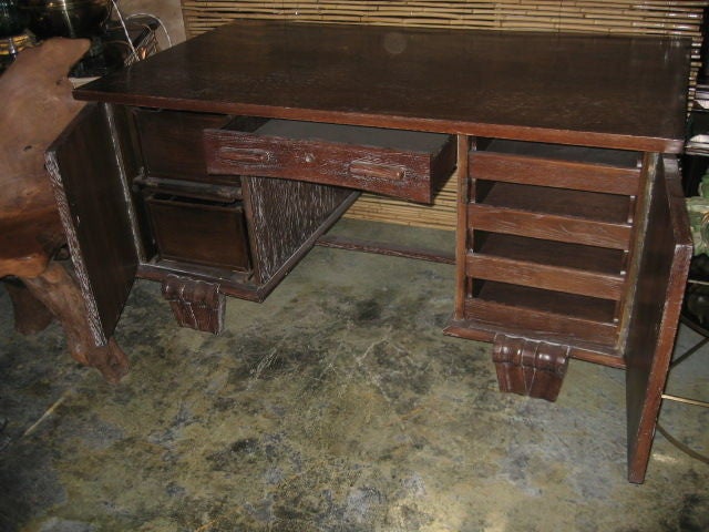 Beautiful Art Deco desk. Lockable center drawer and side cabinets. Cabinets have pull-out file compartments.
