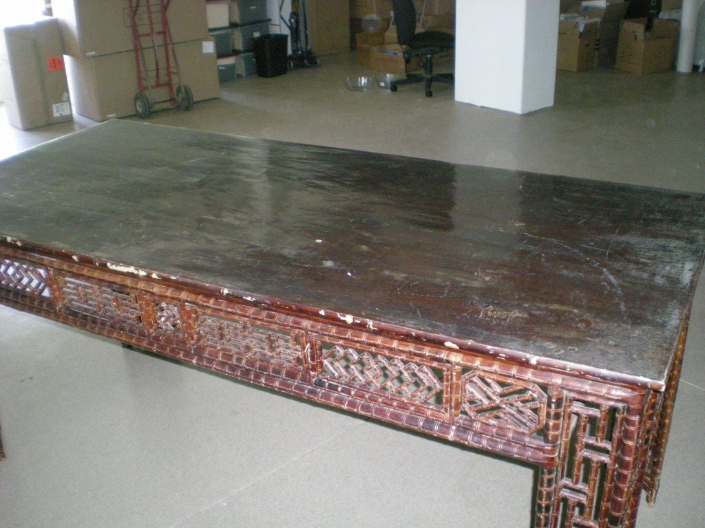 Bamboo console, altar table with black lacquered wooden top. Bamboo base is darkly stained.