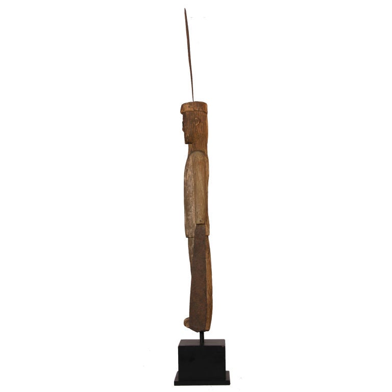 This whirligig of grand stature and whimsical presence is from the Robert Greenberg collection.  He is mounted on a custom black wood base.