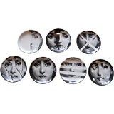 A set of seven coasters by Piero Fornasetti.