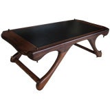 Rosewood and leather coffee table by Don Shoemaker