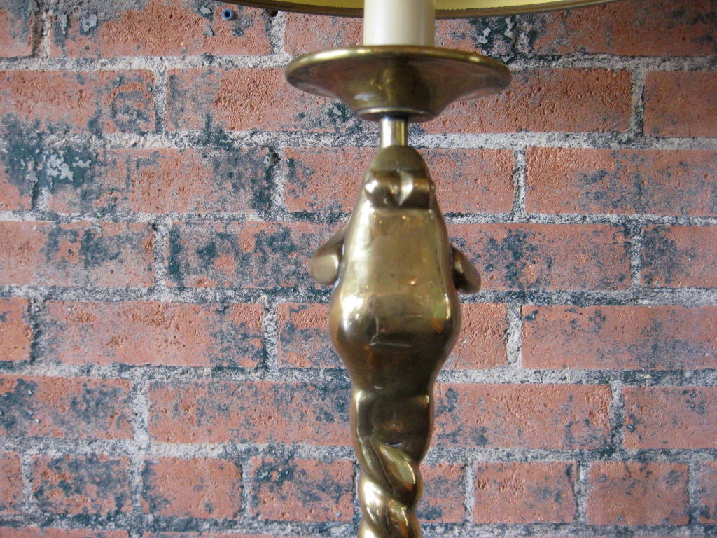 A wonderfully whimsical brass floor lamp by Chapman.