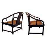Pair of mahogany lounge chairs by Baker