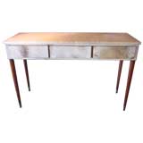 Parchment covered console table with mahogany legs