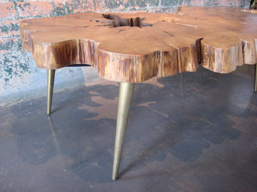 Free edge cyprus slab table with brass legs 1