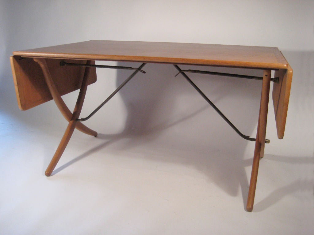 Drop leaf scissor leg table by Hans Wegner