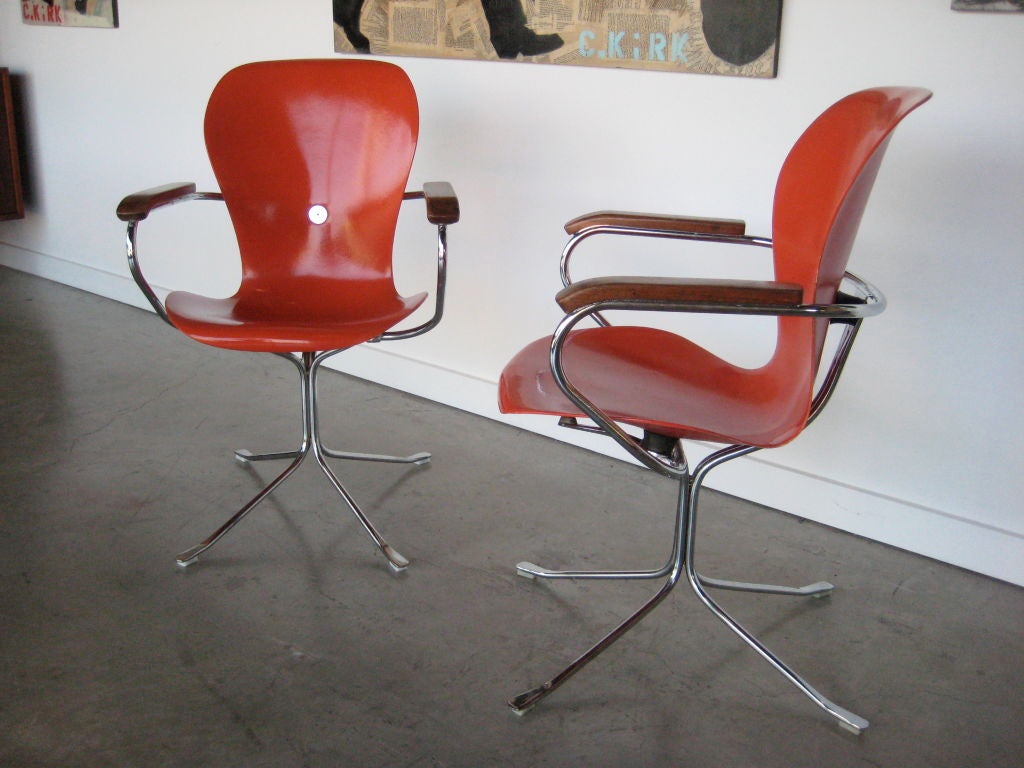 Set of Eight Ion arm chairs designed by Gideon Kramer