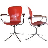 Set of Eight Ion arm chairs designed by Gideon Kramer