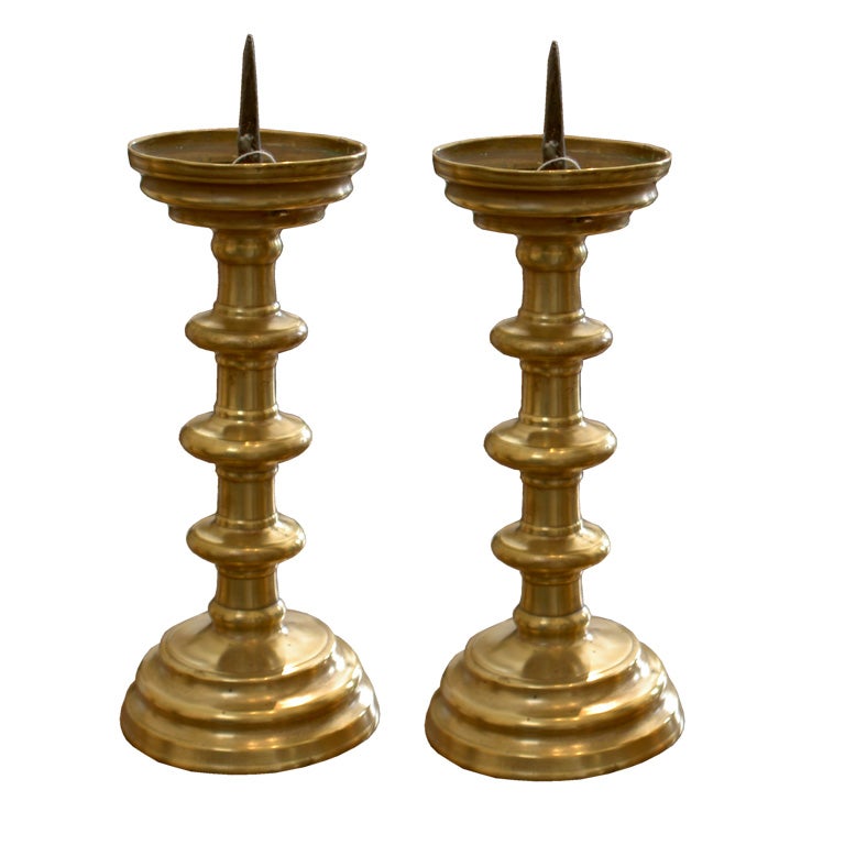 A Pair of Late Gothic Brass Pricket Candlesticks For Sale