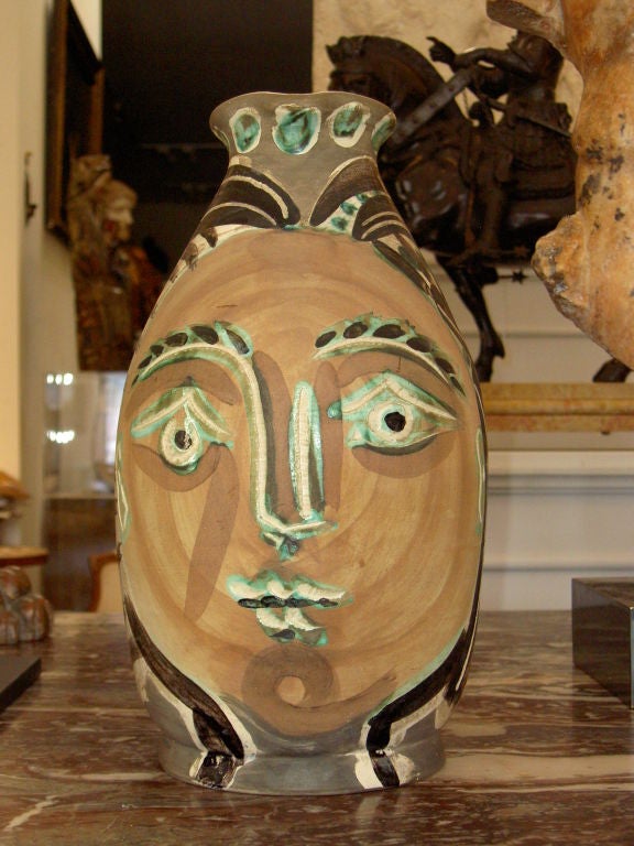 Femme du Barbu<br />
Partially glazed earthenware pitcher<br />
Edition of 500<br />
Impressed mark underneath d'Apres Picasso Madoura Plein Feu<br />
Conceived on July 10, 1953<br />
AR no. 193