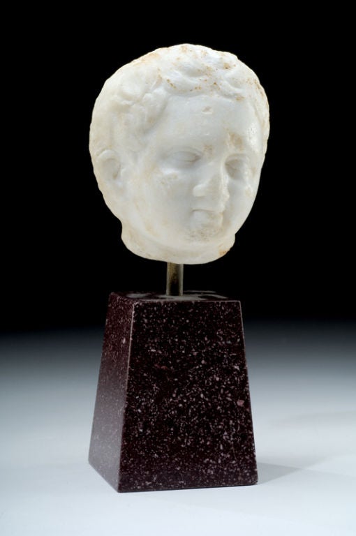 Roman Marble Head of a Young Boy, or possibly Eros
