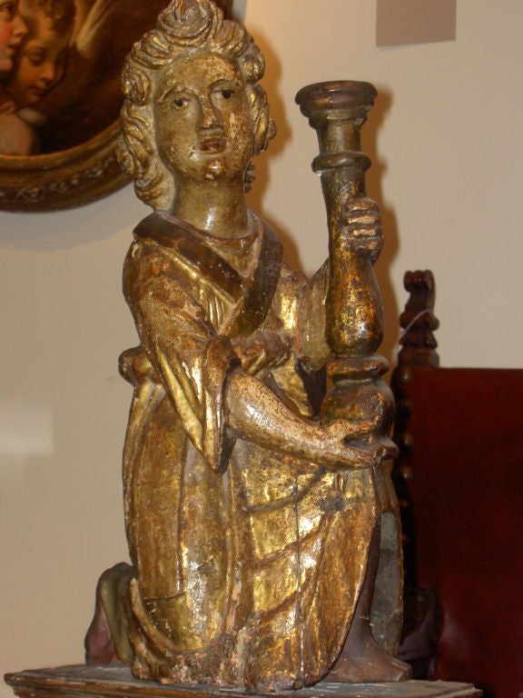 A Pair of Italian Altar Angels Holding Candlesticks