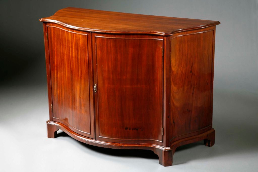 An 18th Century Serpentine Side Cabinet