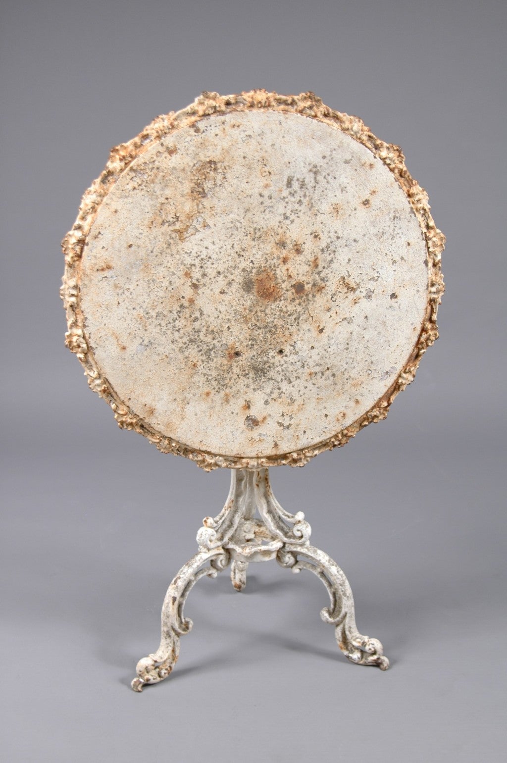 A Cast Iron Tilt Top Tea Table