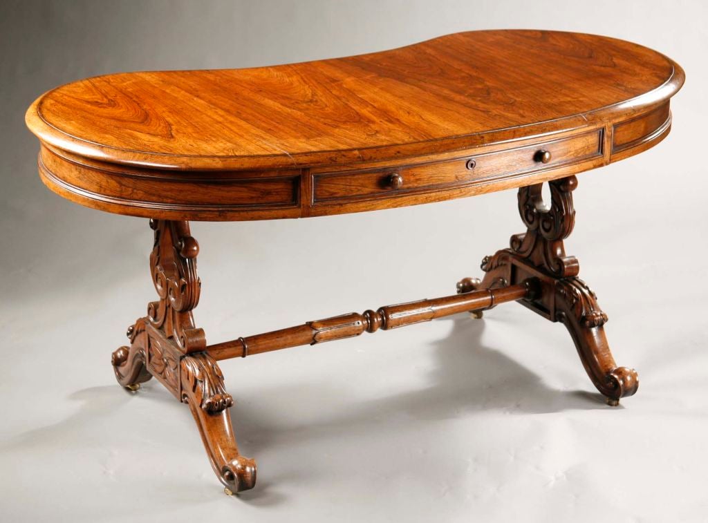 An English Rosewood Kidney Form Desk