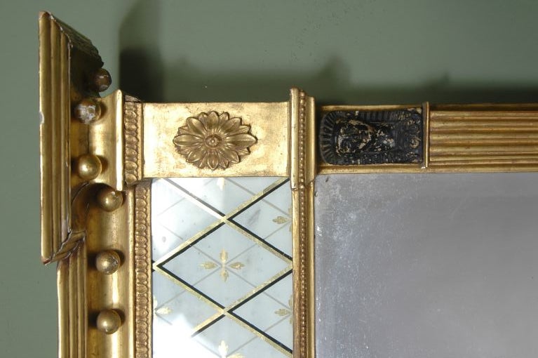 An English Egyptian Themed  Regency Giltwood Pier Mirror