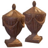 Pair of Neo-Classical cast iron garden urns