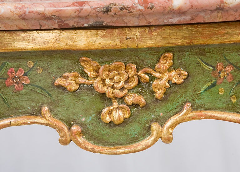 Painted Venetian console with a serpentine shape and the original marble top