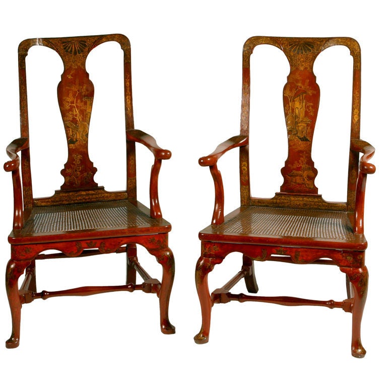 Rare pair of Japanned red lacquer Queen Anne armchairs with chinoiserie decoration, vase shaped back splats and caned seats, over cabriole front legs with pad feet, down-swept rear legs and turned stretchers.