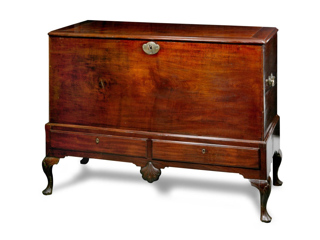Irish George II mahogany coffer on stand with cabriole legs <br />
having shell carved knees with a carved central shell in the<br />
apron.