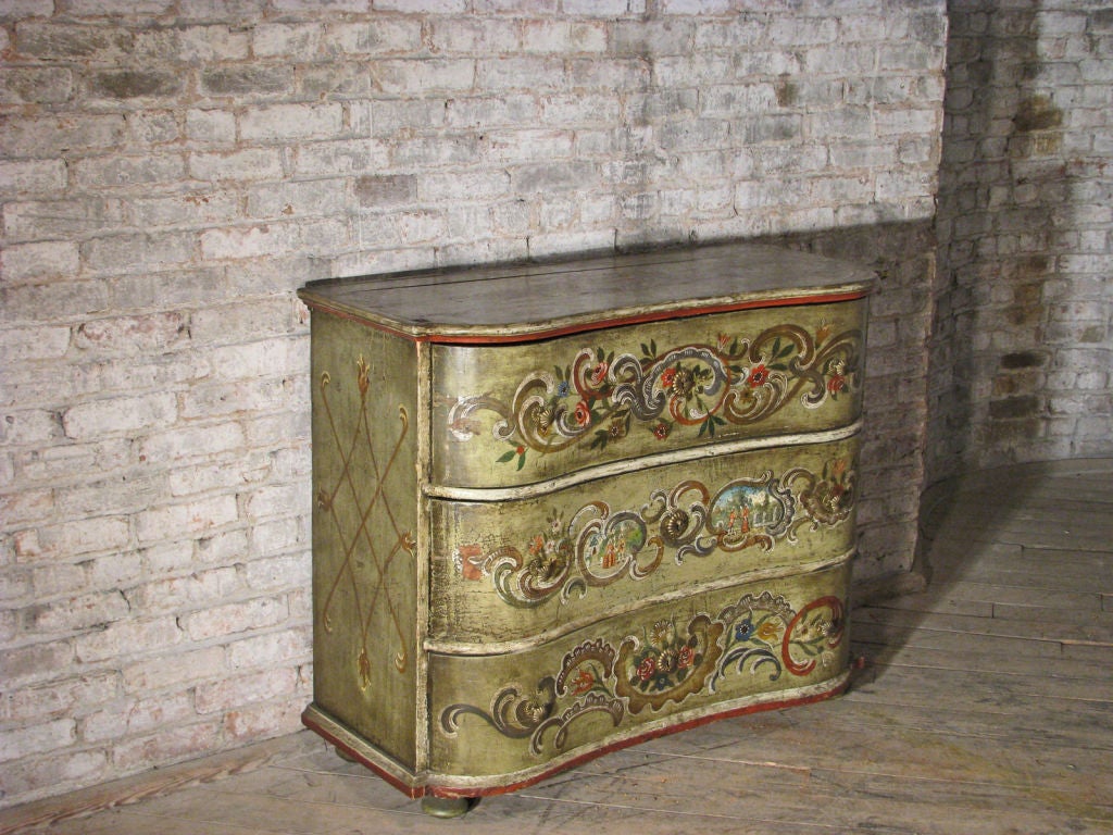 Charming painted commode with three drawers, serpentine front, on small bun feet.
Our pieces are left in lived-in condition, pending our custom conservation and polish to preference.
On consignment from a sophisticated collector.