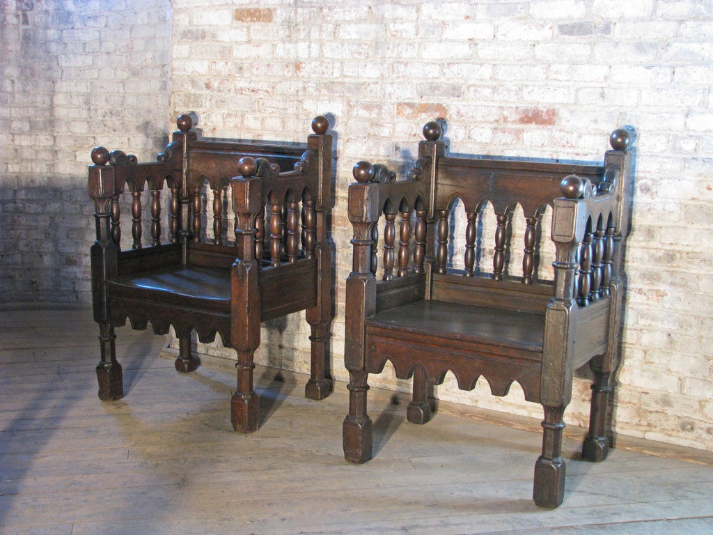 A pair of impressive, massive chairs after a 12th century model from the cathedral in Agnano, Italy.
