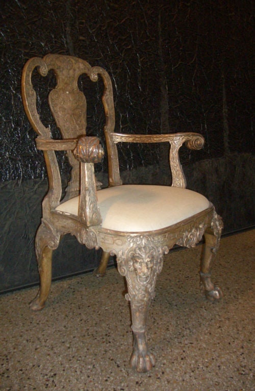 A chair in the style of William Kent in wonderfully worn and decorative  condition.
For reference, a period pair of almost identical chairs is exhibited at the Metropolitan Museum of New York.
