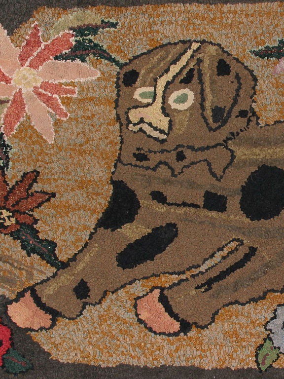 Virtually a glimpse into a hearth scene from times past, this charming rug has an endearing presence. The lovable, long-eared dog lying down next to an array of flowers must have been a family favorite.
