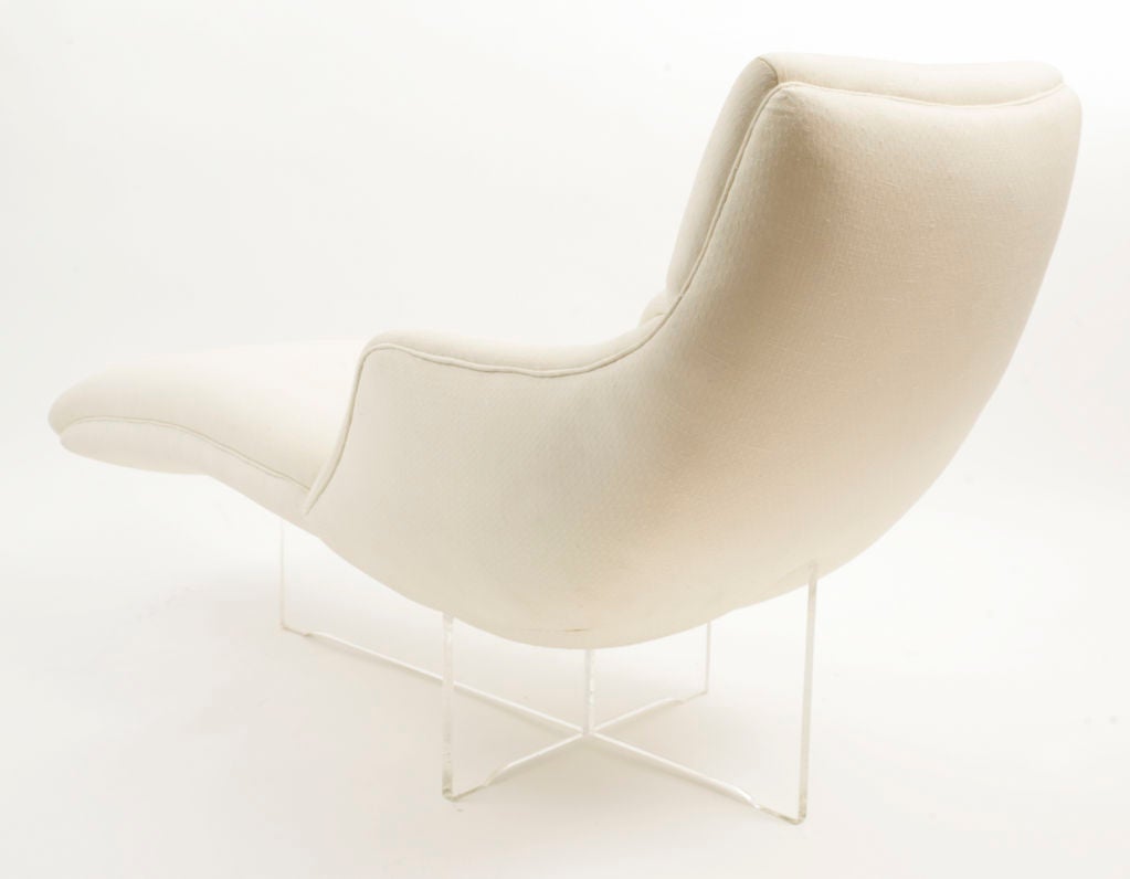Vladimir Kagan 'Erica' chaise.<br />
Modeled after the designer's wife this piece features a sculpted upholstered form with one arm.<br />
The entire chaise appears to float on a solid lucite base.<br />
Excellent original condition.