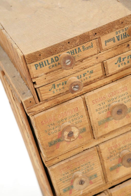 Tramp art apothecary chest circa 1930's. Done with original Sunkist orange Philadelphia cream cheese and Wilson's cheese boxes, this folk art piece would make a great sculpture stand or spice holder or night stand.