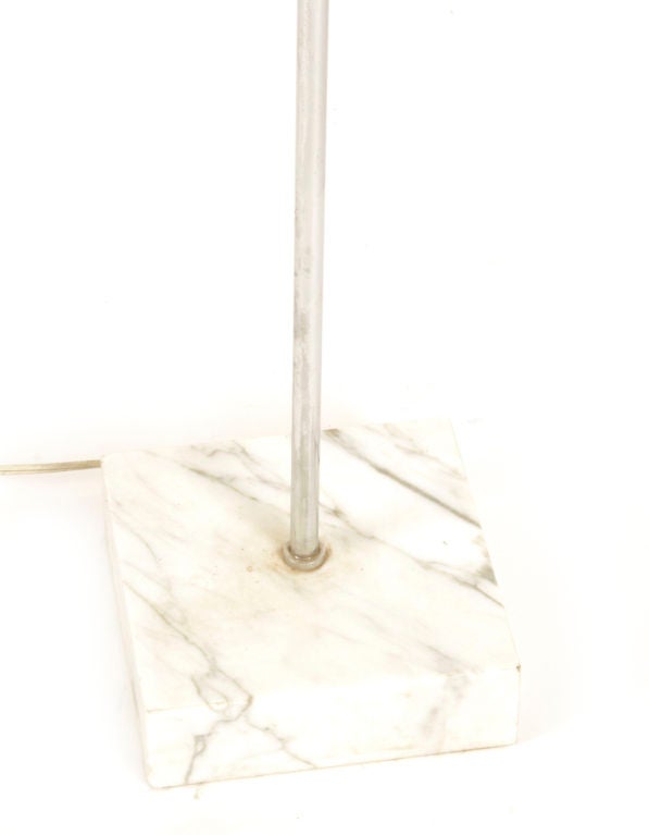 Chrome plated steel and carrera marble floor lamp by Paul Mayen for Habitat circa early 1970's. Features a bubble shade with pivoting head and richly grained marble base. Excellent original condition.