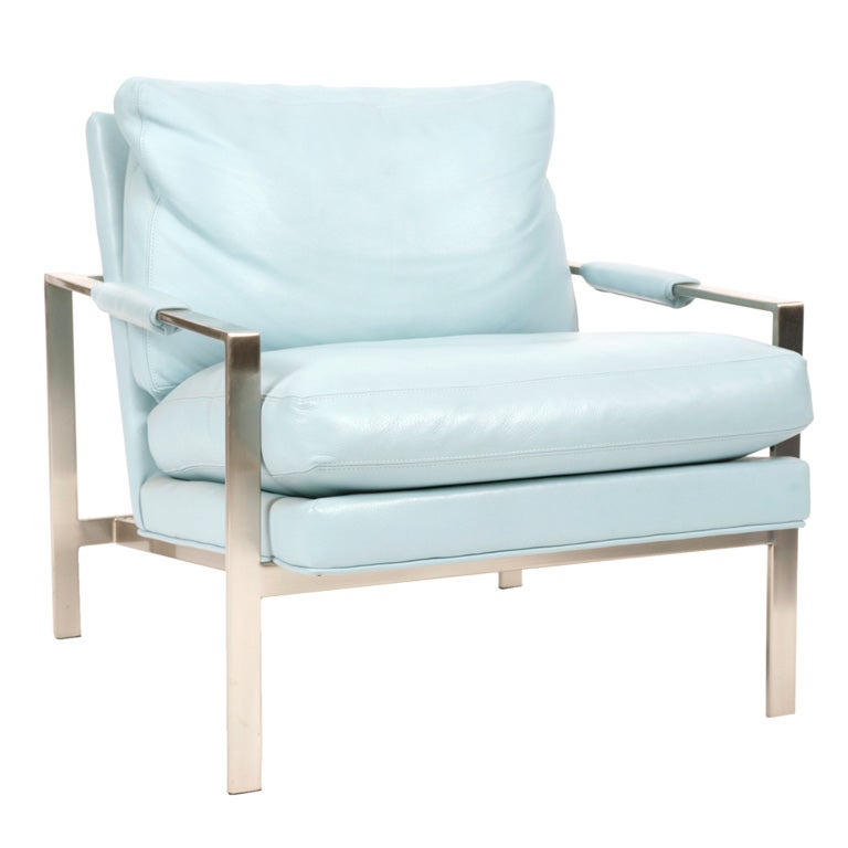 Pair of flat bar brushed steel lounge chairs by Milo Baughman for Thayer Coggin. Feature solid steel frames with stunning original powder blue leather upholstery with down filled back cushions.