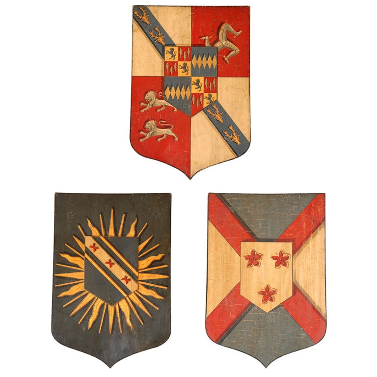 A SET OF THREE ARMORIAL SHIELDS