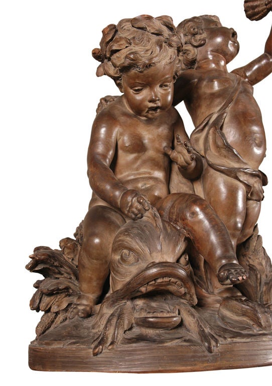 Terra Cotta Statue of Putti and Dolphin