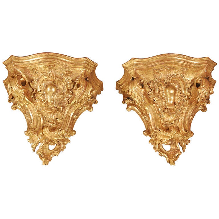 A Pair of Massive Gilt Brackets For Sale