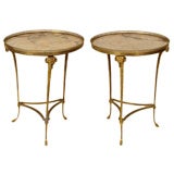 Pair of Directoire style gilt brass and marble gueridons.