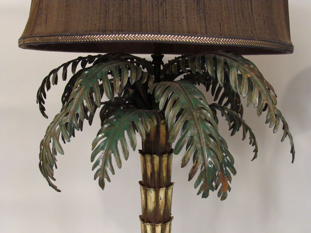 Pair of painted tole palm tree form lamps.