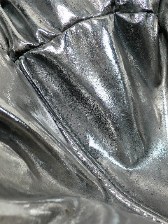 Stainless steel, full scale bean bag chair sculpture by Cheryl Ekstrom. From Ekstrom's series 