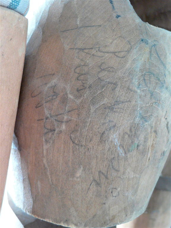 Hand-carved and painted wood puppet with fabric arms, jointed knees & hips, with high-heeled black shoes. Possible signature though illegible to us (see Image 2). <br />
Provenance: Balthrop Collection