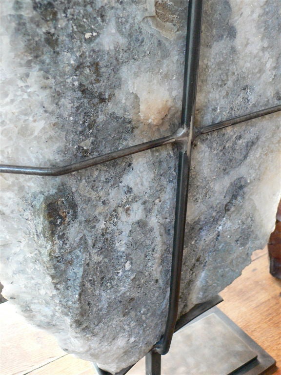 Massive quartz--the matrix covered in quartz prisms with micro-crystalline quartz growth and mounted on a custom steel base and frame.