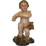 Carved and Polychrome Putto
