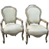 A pair of Damscan Armchairs