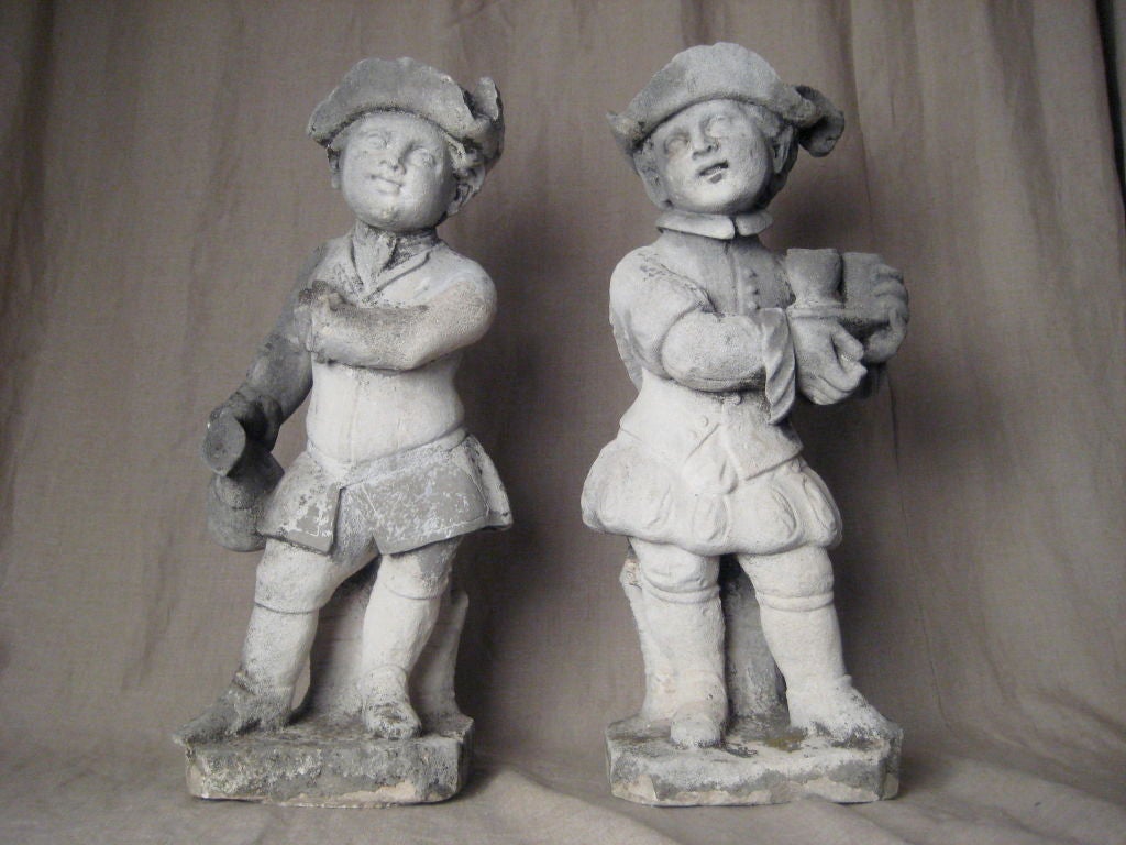 Pair of hand carved Italian limestone statues from Vicenza, Italy.