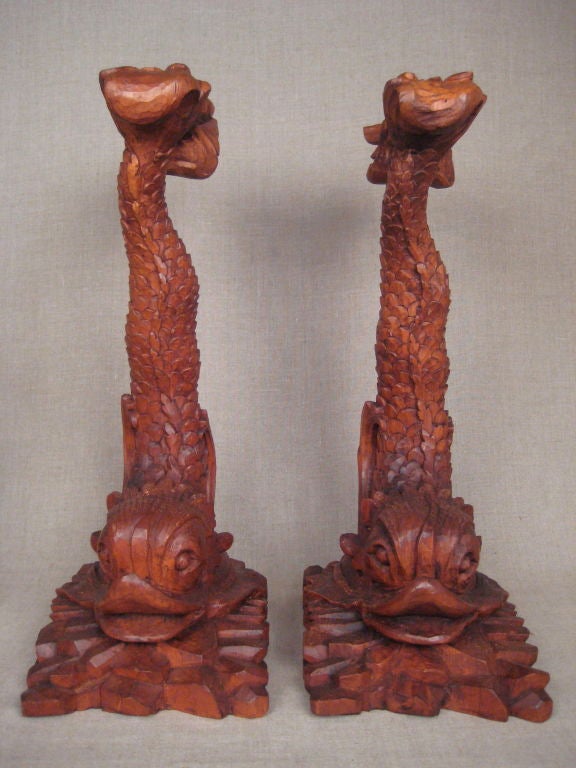Pair of wood dolphin figures