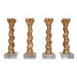 Set of four gilded wood columns