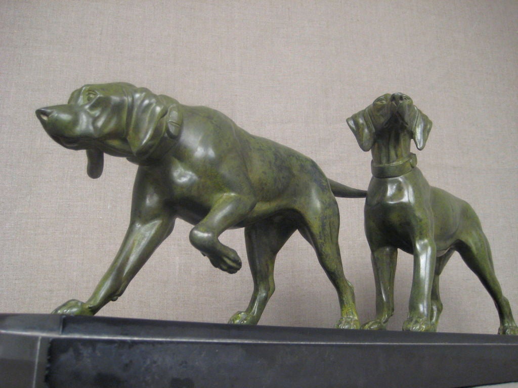 Bronze sculpture of dogs
