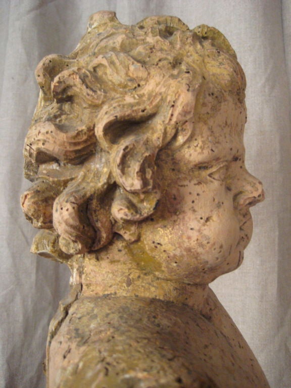 Italian Carved Wood Statue of a Cherub For Sale