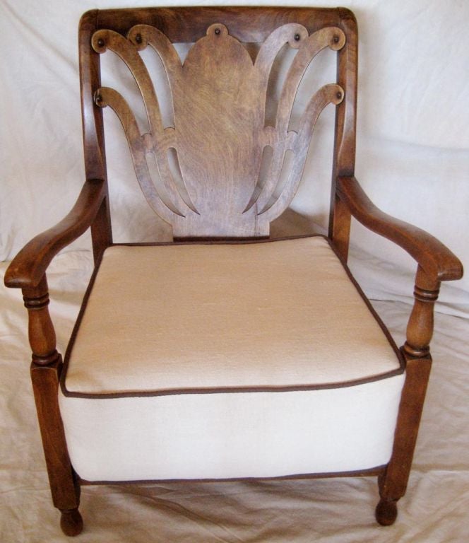 Unusaul pair of Italian arm chairs. Great fireside chairs.