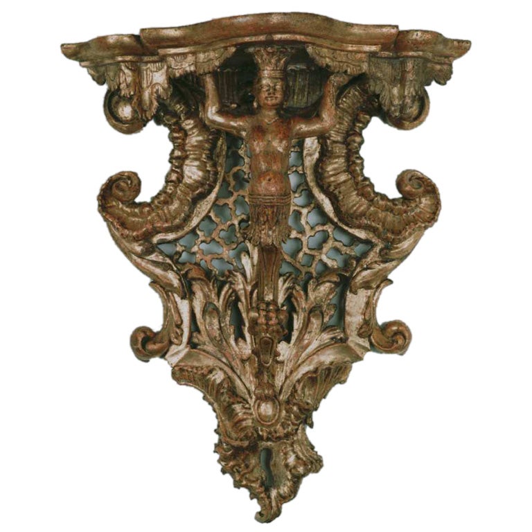 A gilded wood console bracket (wandkonsole);  original gilding For Sale